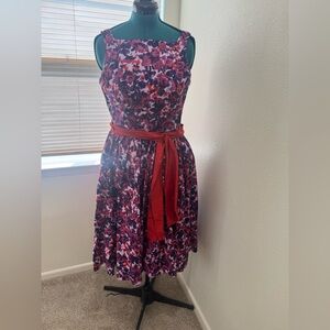 Pinup Couture Purple Floral Swing Dress with Red Sash
